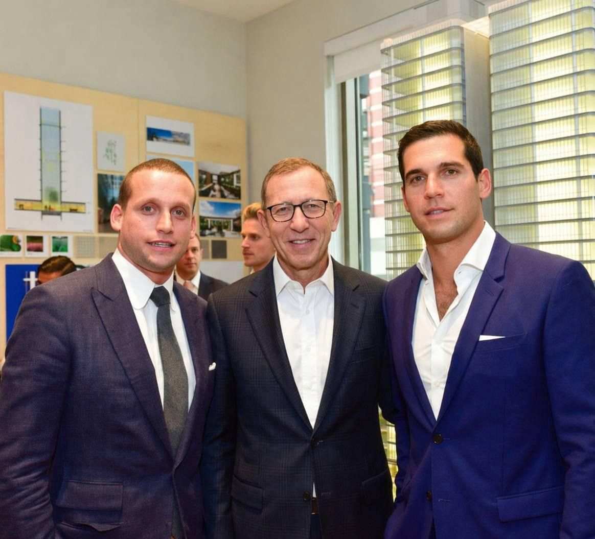 Mark Tsesarsky photographed with the Alexander brothers